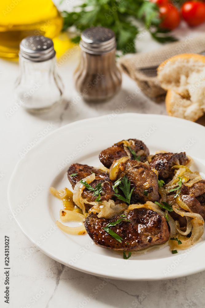 Fried chicken liver with onions. Fried chicken liver with onions.