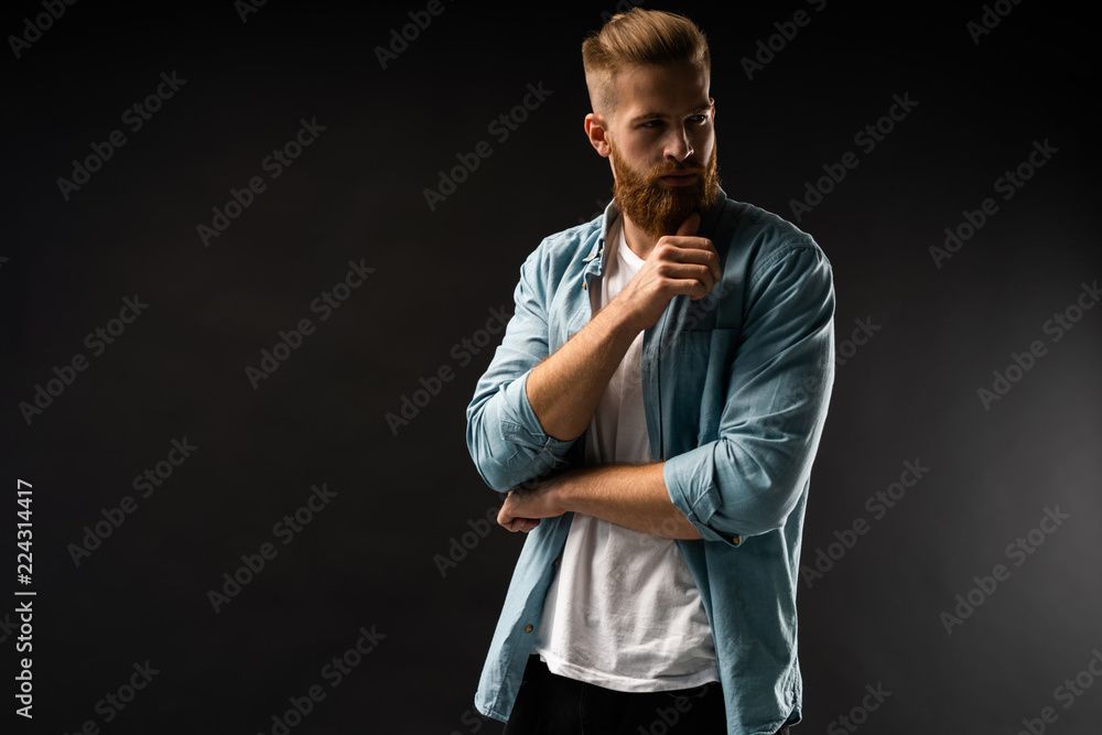 Portrait of happy fashionable handsome man in jeans shirt look at camera.