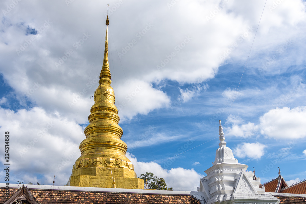 Fototapeta premium Temple with cloud sky at Thailand.
