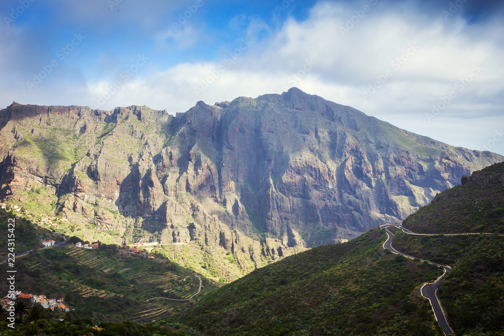 Mountain serpentine. Landscape of the Masca Gorge. Beautiful views of the coast with small villages in Tenerife, Canary Islands