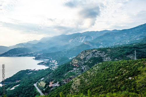 aerial view of Budva riviera, Adriatic sea and mountains in Montenegro