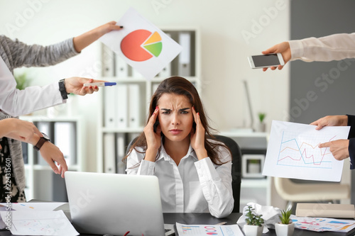Stressed worker with a lot ...