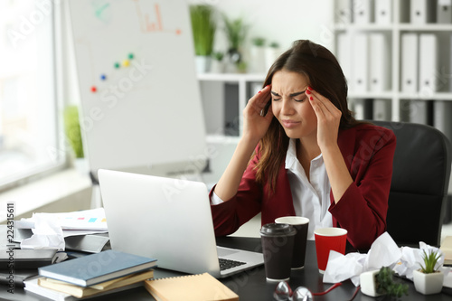 Stressed businesswoman work...