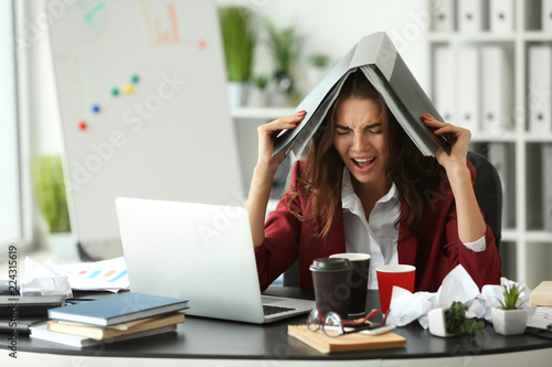 Stressed worker with a lot ...