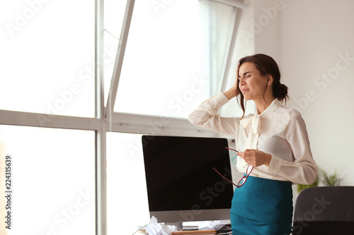 Stressed businesswoman work...