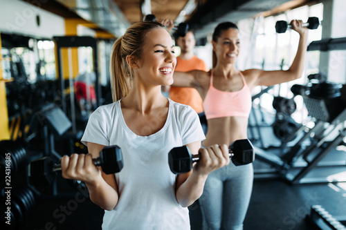 Fototapeta Naklejka Na Ścianę i Meble -  Women working out in gym