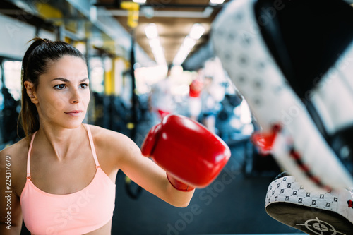 Boxing workout woman in fitness class ring photo