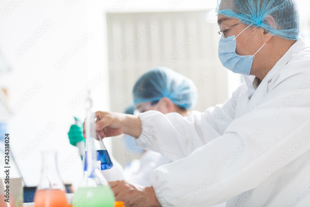 people working at laboratory people working at laboratory