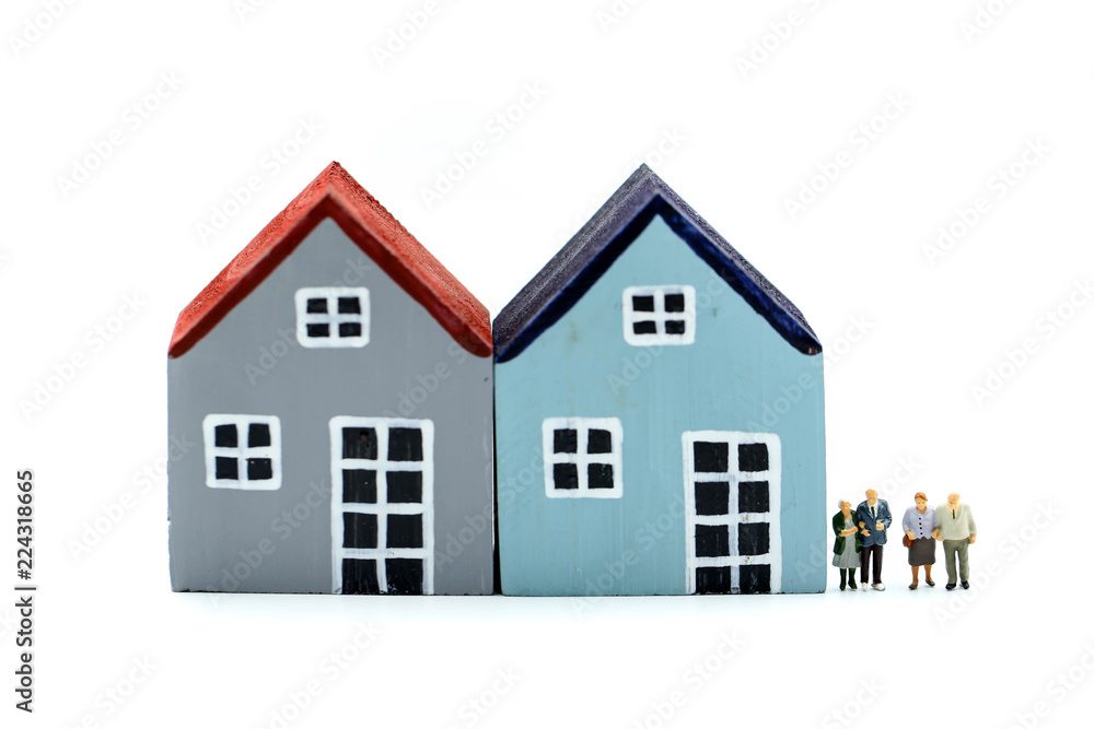 Miniature people: Couple of Oldmans standing with house, money saving growth. Retirement, emergency plan and Financial Concept.