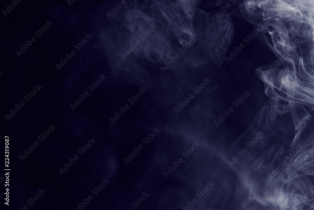 Fototapeta premium grey smoke on a dark background