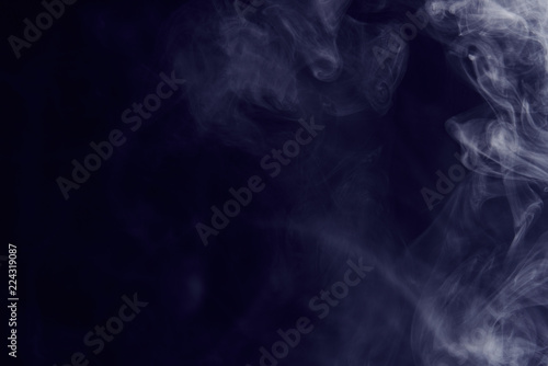 grey smoke on a dark background