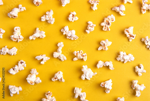 popcorn on a yellow background as a background