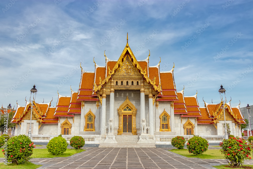 The Marble Temple, Wat Benchamabophit Dusitvanaram Bangkok THAILAND with blue sky at background