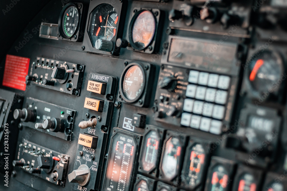 Helicopter cockpit. Details of dashboard, control panel, indicators and fire buttons. War machine, air bomber. 