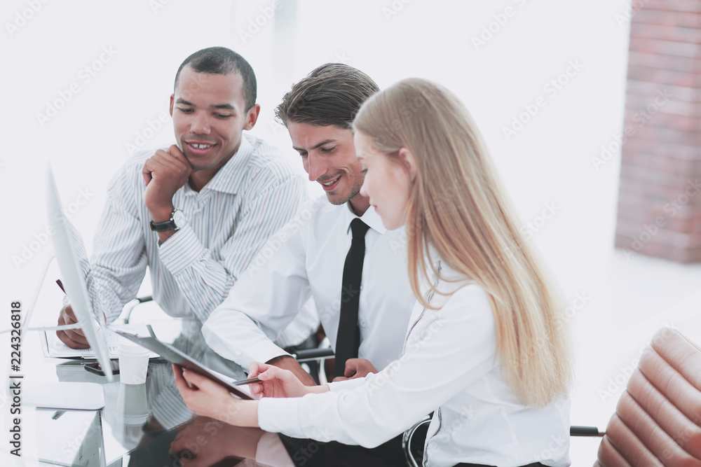 friendly business team discussing promising business ideas. friendly business team discussing promising business ideas.