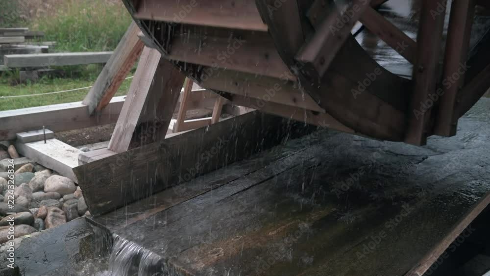 Wooden Water Wheel close up 4K UHD. Close up of a wooden water wheel turning. 4K, UHD.
Wooden Water Wheel close up 4K UHD. Close up of a wooden water wheel turning. 4K, UHD.