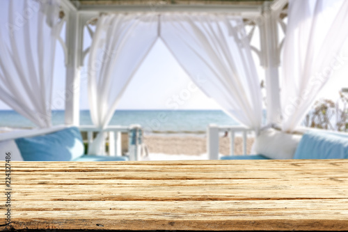 Table background of free space and summer beach landscape 