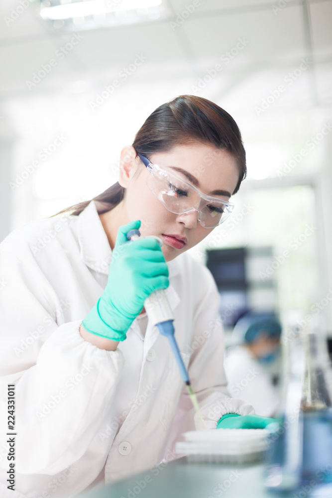people working at laboratory people working at laboratory