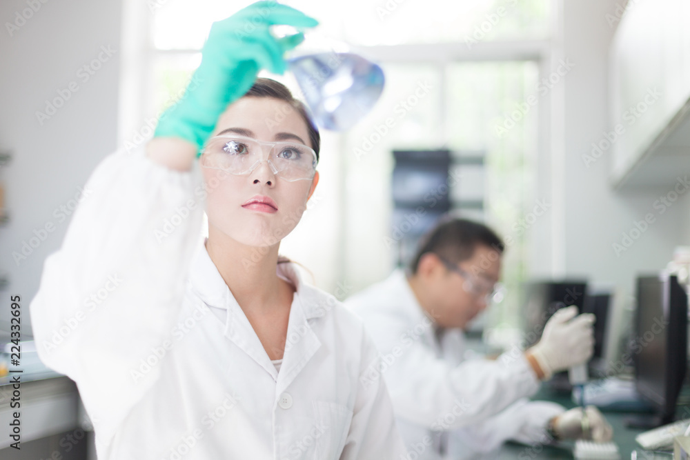people working at laboratory people working at laboratory
