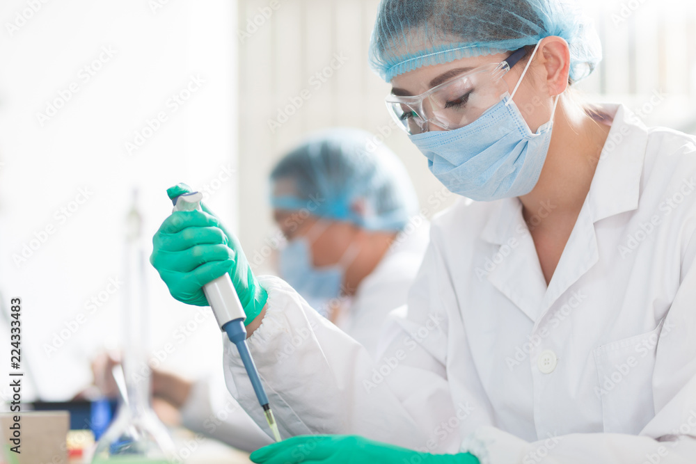 people working at laboratory people working at laboratory