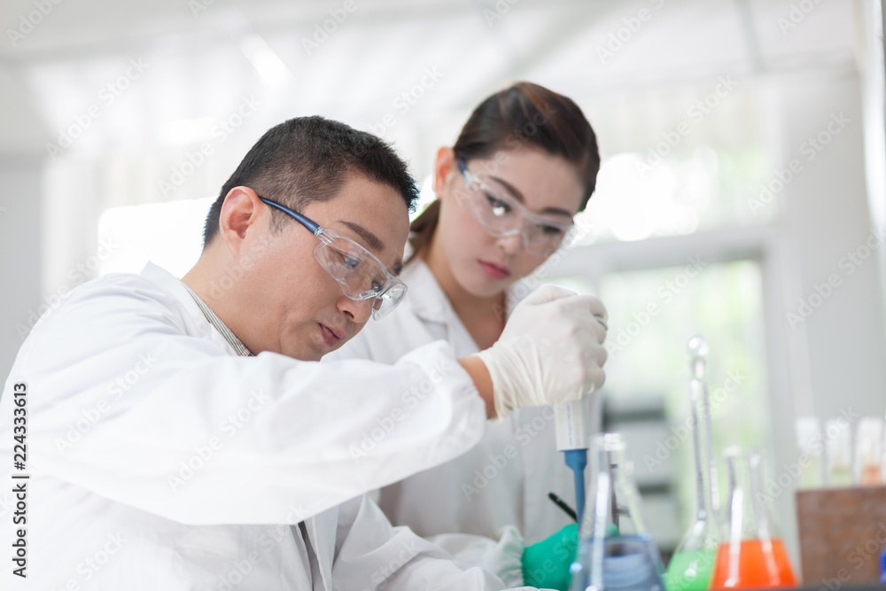 people working at laboratory people working at laboratory