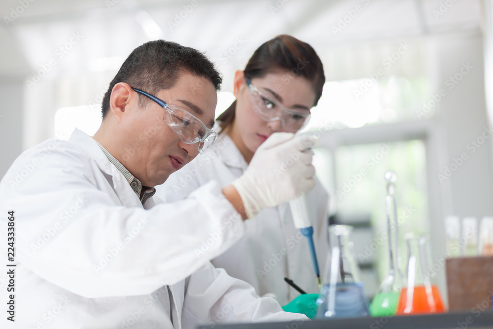 people working at laboratory people working at laboratory