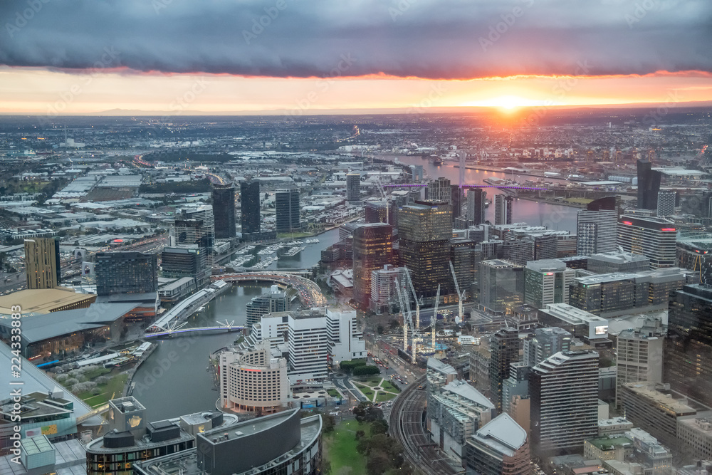 City skyscrapers and Yarra river aerial view at sunset from high point of view, Melbourne