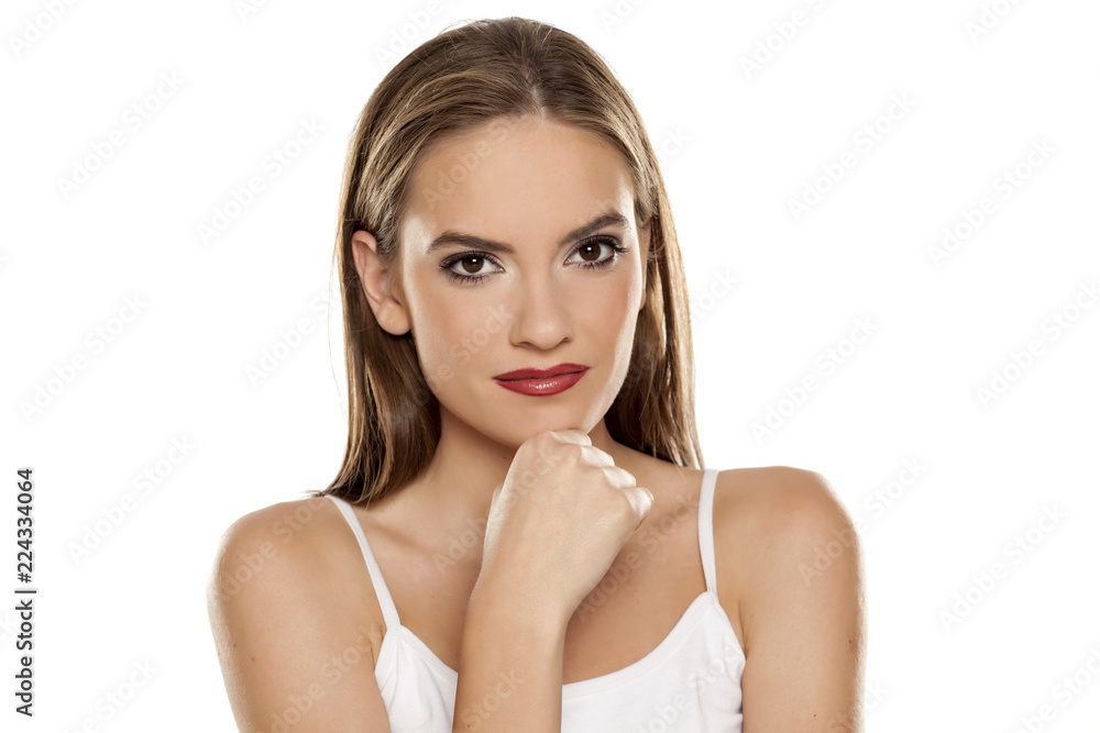 Portrait of young beautiful woman with makeup on white backgeound Portrait of young beautiful woman with makeup on white backgeound