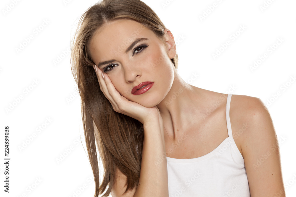 Beautiful girl with tootache on white background Beautiful girl with tootache on white background