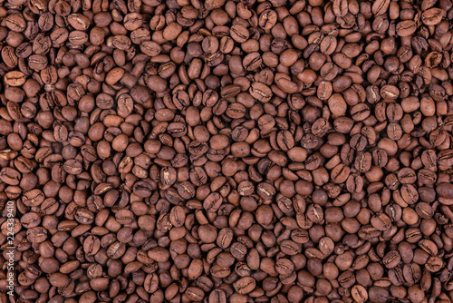 Roasted arabica coffee beans background or texture