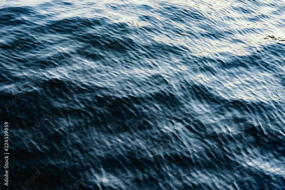 Sea surface as natural background, color toned. Sea surface as natural background, color toned.