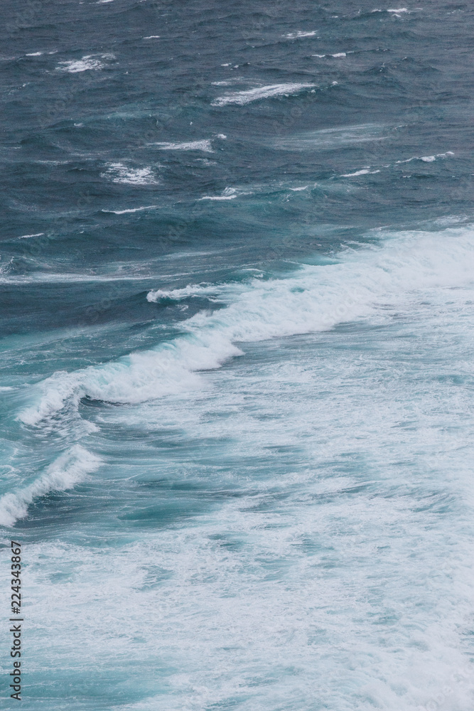 aerial view of ocean with foamy waves for background