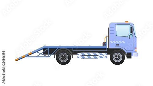 Tow truck with equipped winch, lifting transport to platform.