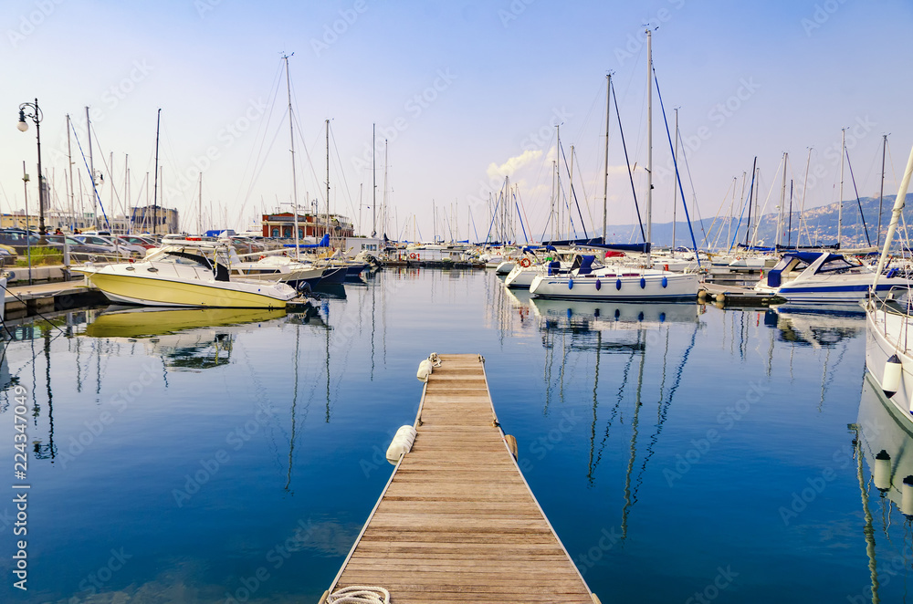 Fototapeta premium Pier, sailboats and yachts at marina in Triest port