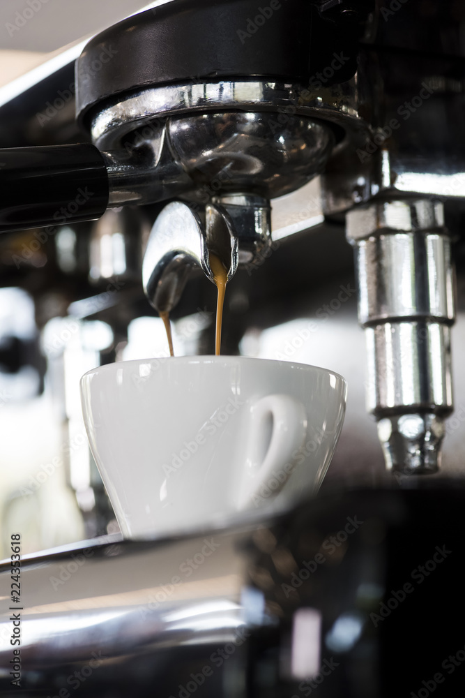 Professional coffee machine is preparing coffee speciality. Closeup. Professional coffee machine is preparing coffee speciality. Closeup.