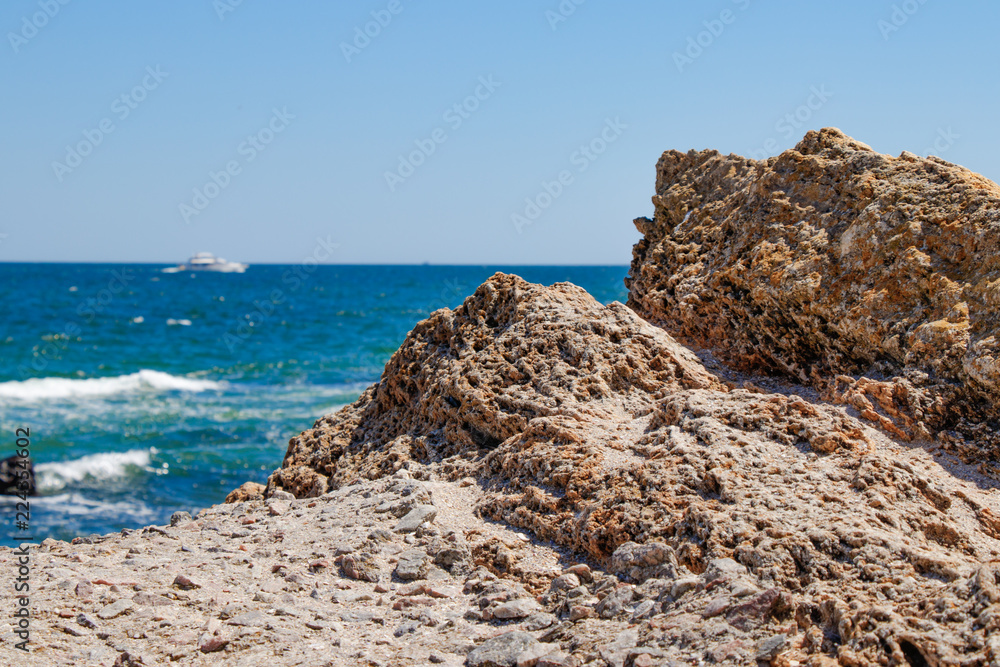 Photo of a sea landscape with a rocky beach Photo of a sea landscape with a rocky beach