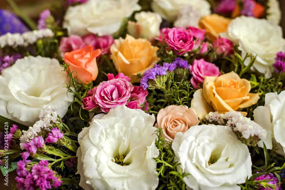 a bouquet of beautiful flowers for a woman a gift for the anniversary of many different kinds of flowers