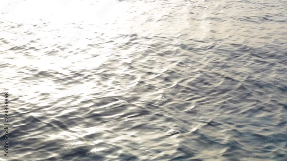 Beautiful shiny morning sea water background. Handheld shooting. Real time full hd video footage. Beautiful shiny morning sea water background. Handheld shooting. Real time full hd video footage.