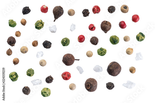Different colored peppercorns isolated on white background.