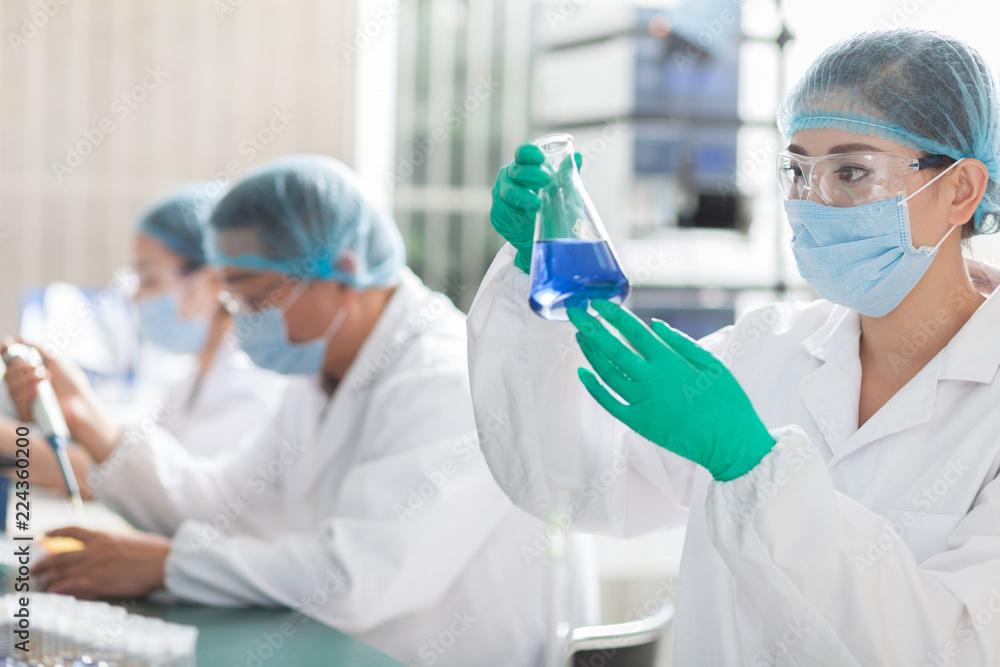 people working at laboratory people working at laboratory