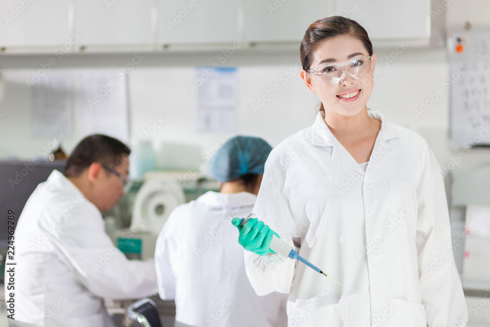 people working at laboratory people working at laboratory