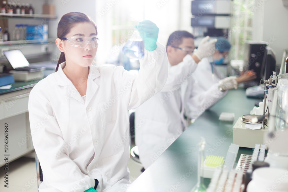 people working at laboratory people working at laboratory