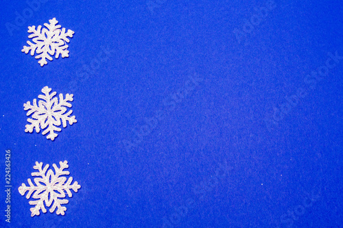 Christmas background. Christmas decoration. Snowflakes on blue background.