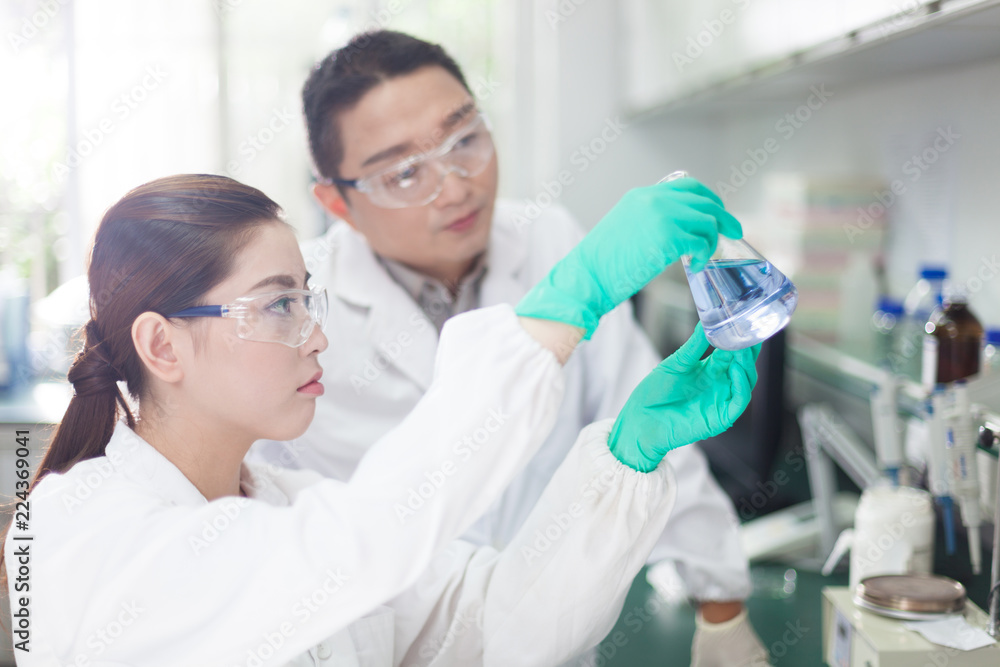 people working at laboratory people working at laboratory