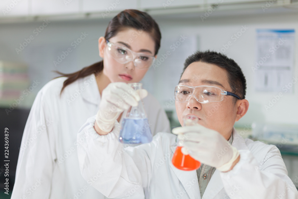 people working at laboratory people working at laboratory