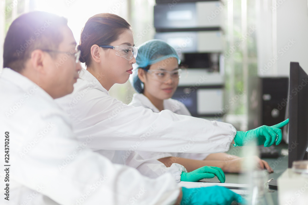 people working at laboratory people working at laboratory