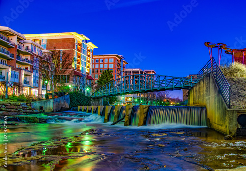 Reedy River and RiverPlace Bridge in Downtown Greenville, South Carolina, USA