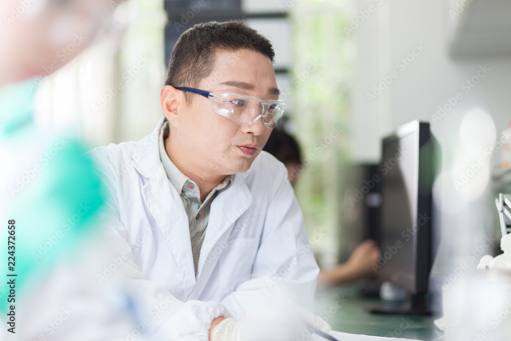 people working at laboratory people working at laboratory