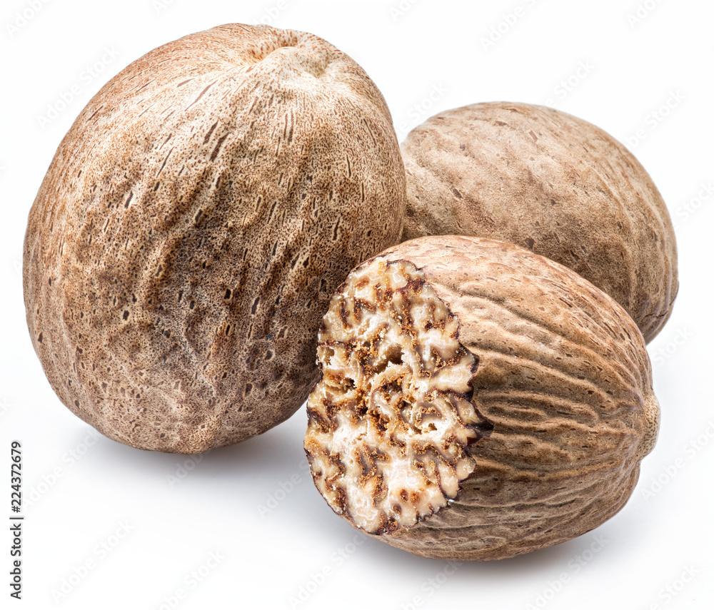Dried seeds of fragrant nutmeg isolated on white background. Dried seeds of fragrant nutmeg isolated on white background.
