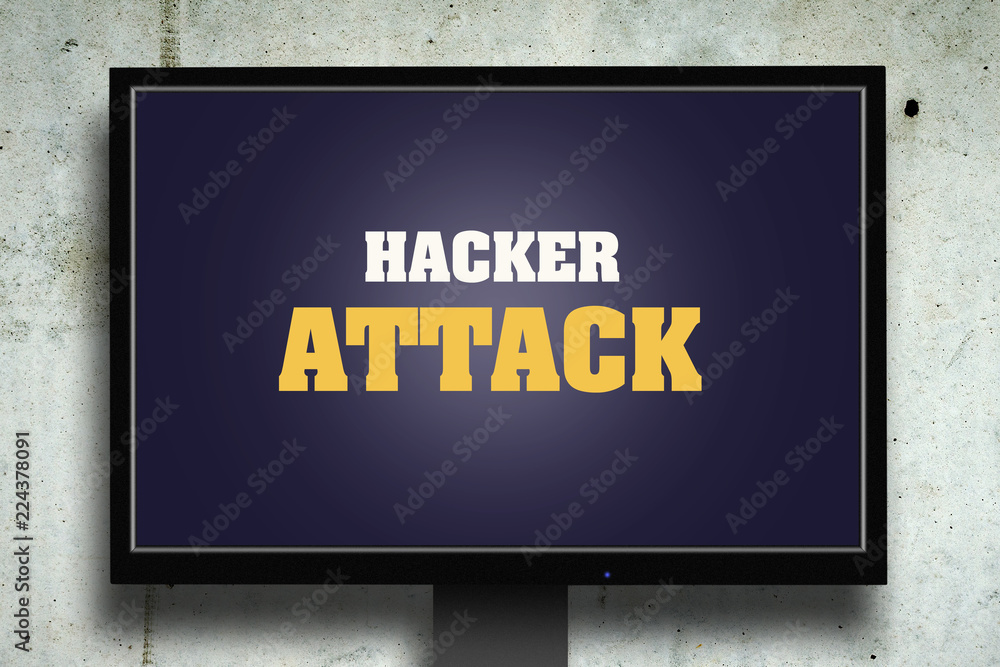 Hacker attack. The inscription on the monitor. Gray concrete background. Security concept. Computers. Hacker attack. The inscription on the monitor. Gray concrete background. Security concept. Computers.
